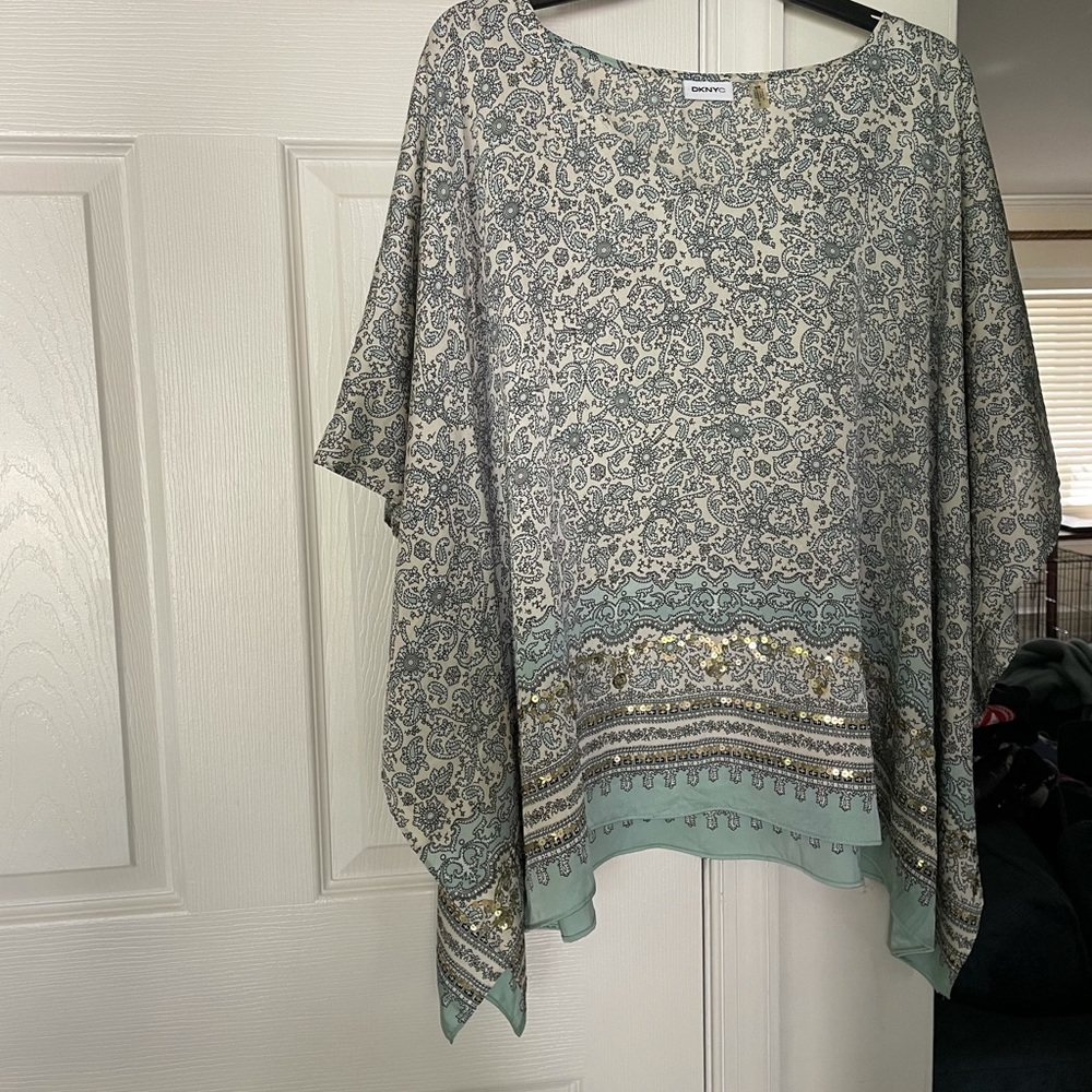 Tunic - 20” from v-neck to the bottom hem.